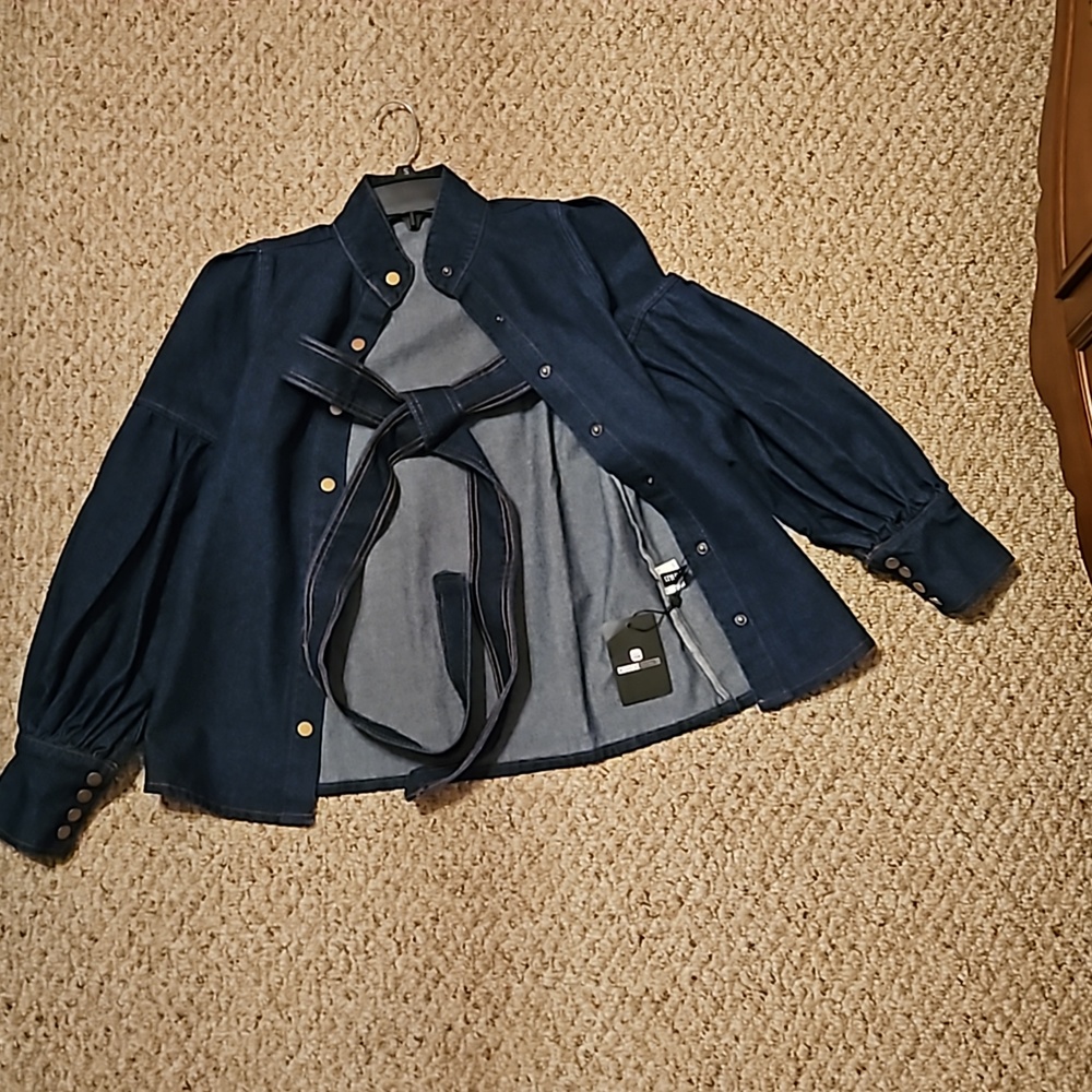 Denim Jean Jacket, size small. New with tag and 24 inches from shoulder length.